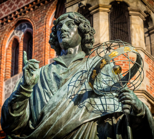 Nicolaus Copernicus Monument Nicolaus Copernicus Monument, Torun, Poland. The monument made by Christian Friedrich Tieck, located on the Old Town Square, unveiled in 1853.