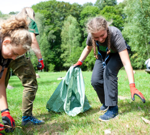 Scouts pick trash in a forest during Leaders' Jamboree in Perkoz, Poland August 16, 2019. ZHP/Michal Wiraszka